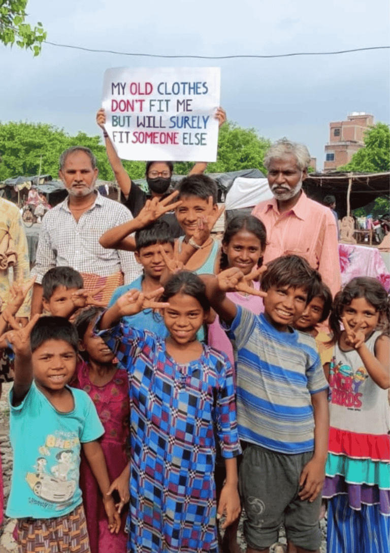 She Can Foundation volunteers and children